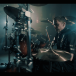 Yanic Bercier behind his Yamaha drum kit in music video As Hope Welcomes Death by Gone in April