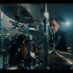 Yanic Bercier behind his Yamaha drum kit in music video As Hope Welcomes Death by Gone in April