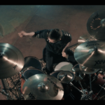 Yanic Bercier behind his Yamaha drum kit in music video As Hope Welcomes Death by Gone in April