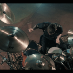 Yanic Bercier behind his Yamaha drum kit in music video As Hope Welcomes Death by Gone in April