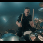 Yanic Bercier behind his Yamaha drum kit in music video As Hope Welcomes Death by Gone in April