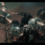 Yanic Bercier behind his Yamaha drum kit in music video As Hope Welcomes Death by Gone in April