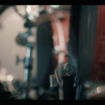 Kickdrum pedal shot in Gone in April music video